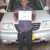 Customer photo for a Japanese used SUZUKI ESCUDO exported from Japan to Tanzania by EVERYCAR.jp