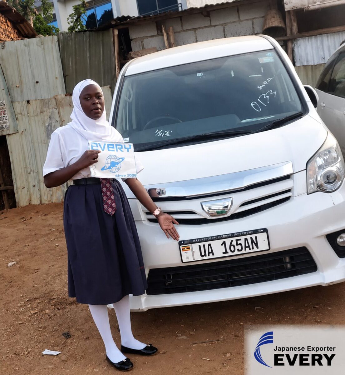 Customer in Uganda with a Japanese used TOYOTA NOAH supplied through EVERYCAR.jp