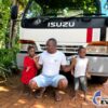Customer in Uganda with Japanese used ISUZU FORWARD JUSTON dump truck supplied by EVERYCAR.jp