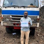 Customer with a MITSUBISHI GREAT dump truck supplied from Japan to DR Congo through EVERYCAR.jp