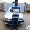 Customer with a TOYOTA COROLLA SEDAN supplied through EVERYCAR.jp in Zambia