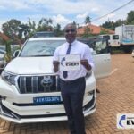 Customer delivery of a TOYOTA LAND CRUISER PRADO exported from Japan to Uganda through EVERYCAR.jp