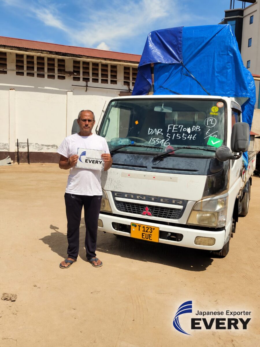 MITSUBISHI CANTER flatbed truck exported from Japan to a business customer in Tanzania through EVERYCAR.jp